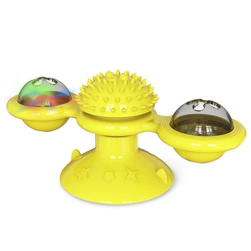 Yellow multi-sensory toy with textured and smooth surfaces on a white background